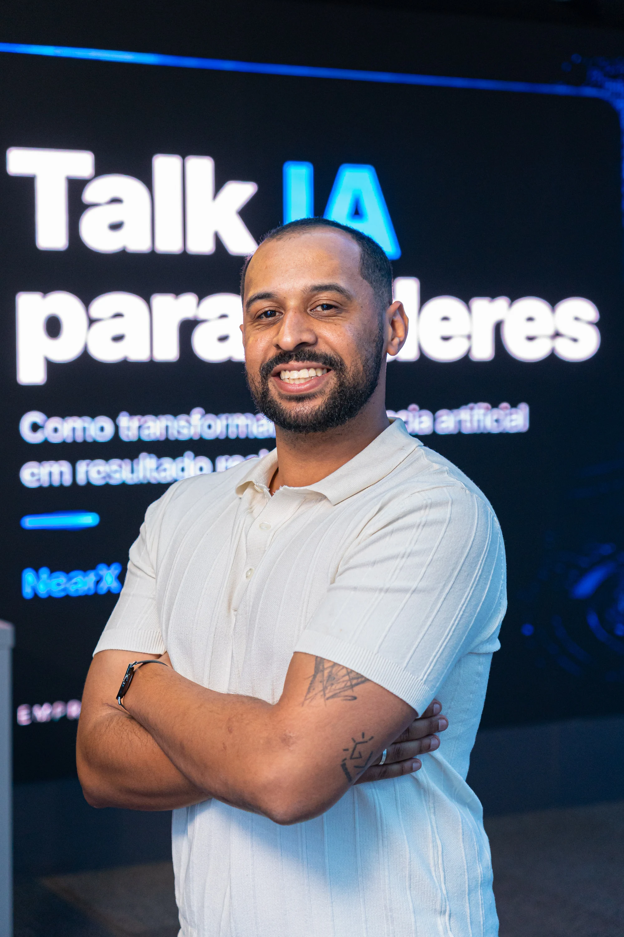 Leonardo Passos sorrindo no evento IA para Líderes